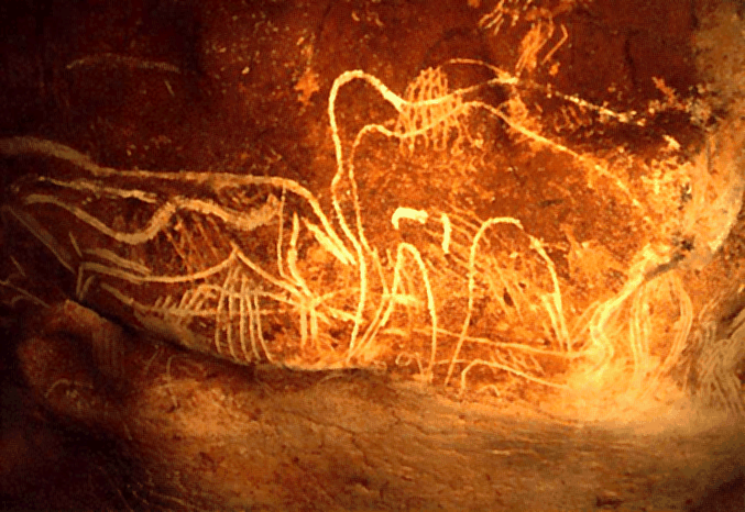 Image Description: Cave Painting featuring a Mammoth and other animals.
