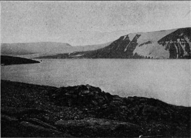 Stone igloos on the bleak coast of Greenland